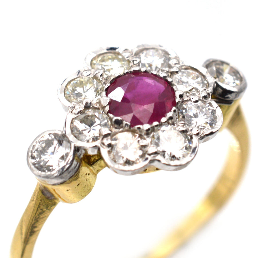 Vintage ruby and diamond cluster ring in 18ct gold and platinum, 1960s-1980s elegant design.