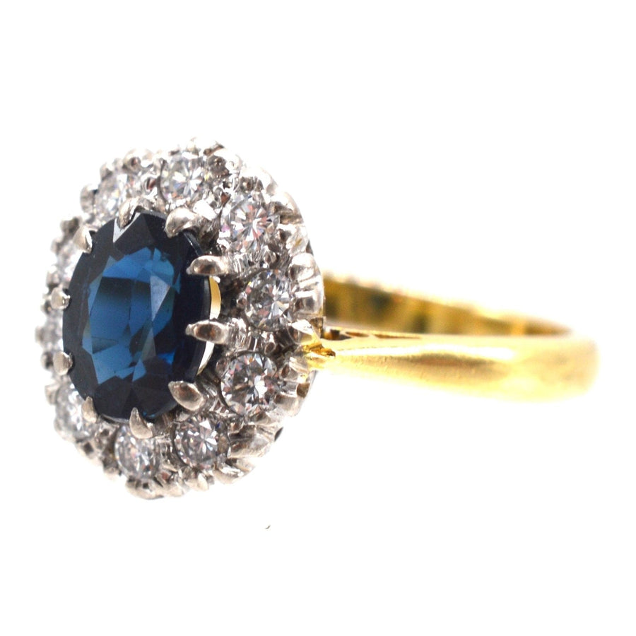 Vintage 18ct gold sapphire and diamond oval cluster ring, perfect for an elegant engagement.