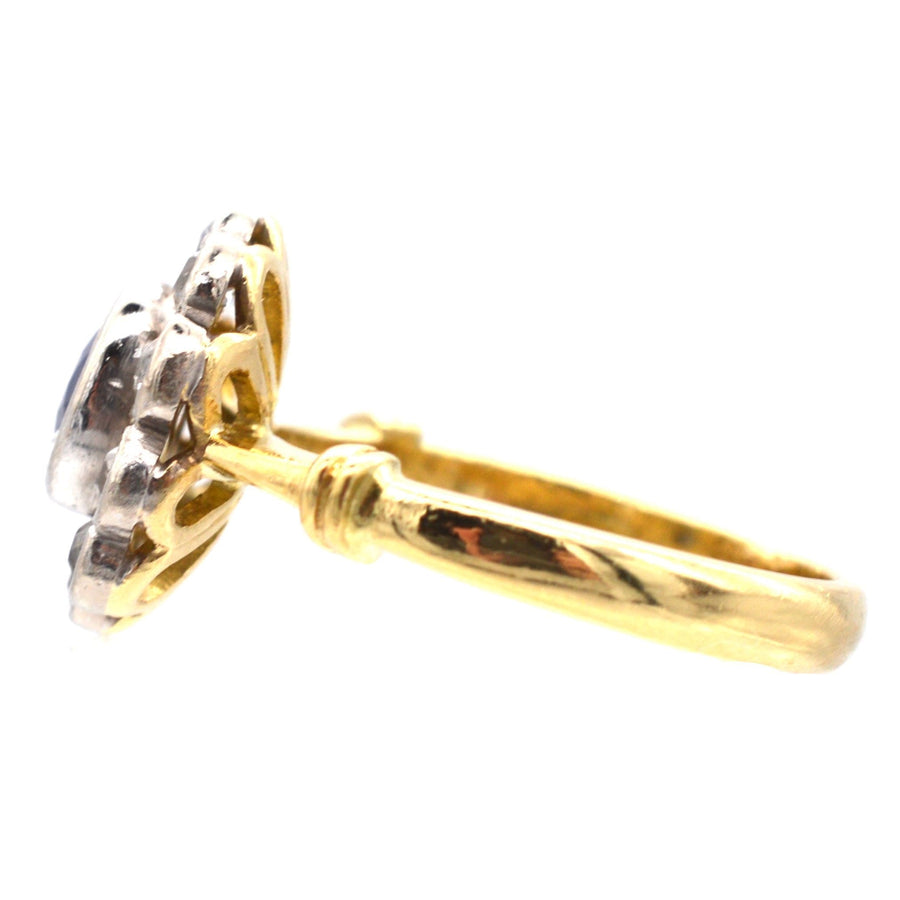 Vintage 18ct gold sapphire and diamond cluster ring showcasing classic beauty and stunning craftsmanship.