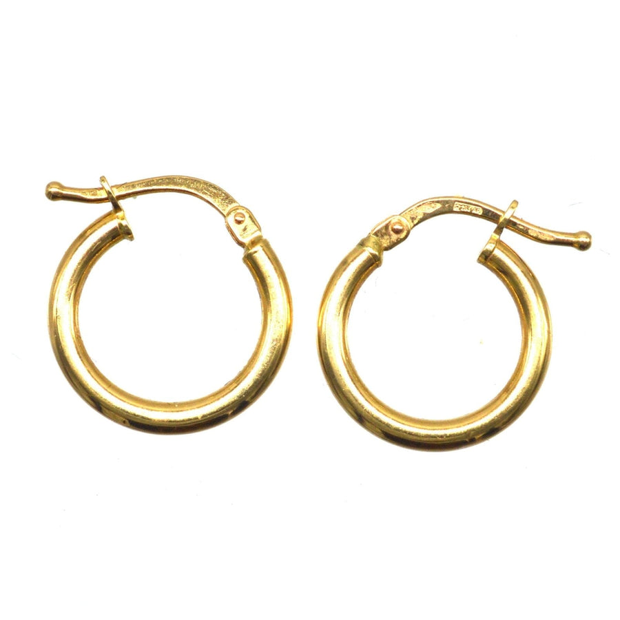 Vintage 18ct gold simple hoop huggie earrings, perfect for formal or casual wear.
