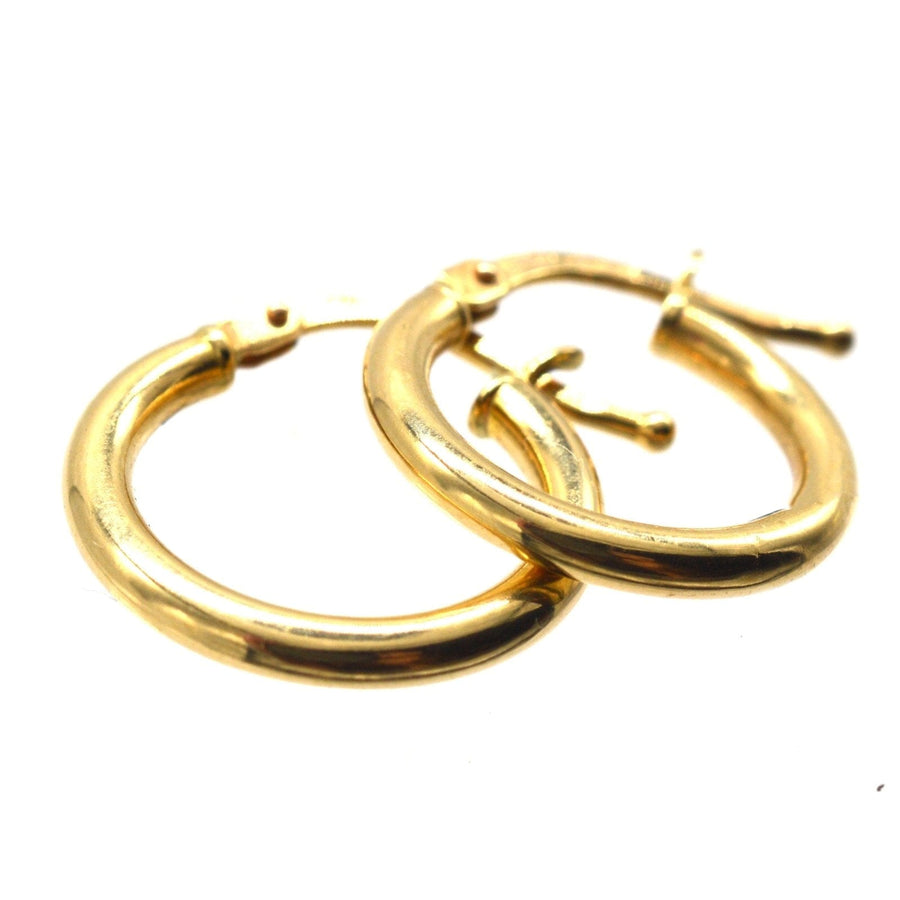 Vintage 18ct gold simple hoop huggie earrings, perfect for any occasion, adding elegance to your jewelry collection.