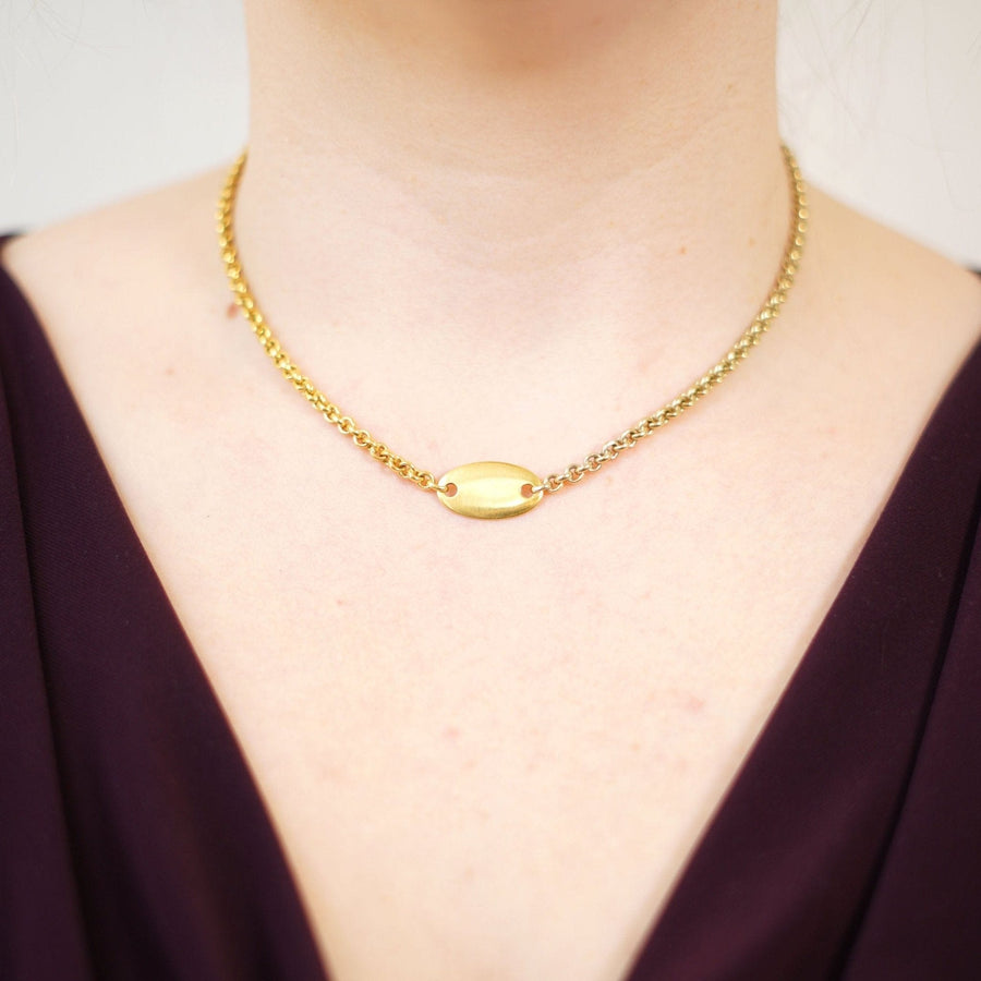 Vintage 18ct gold trace link chain necklace with oval name tag pendant, perfect for layering.