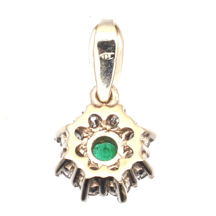 Vintage 18ct white gold pendant featuring an emerald center surrounded by diamonds, ideal for any jewelry collection.