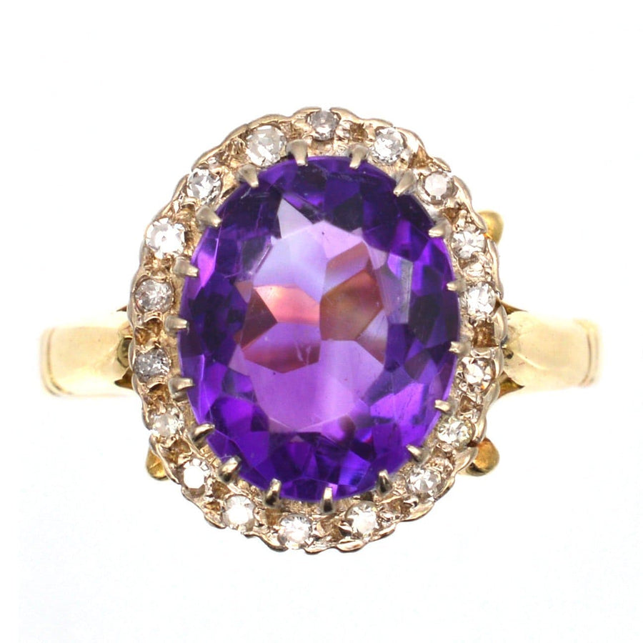 Vintage 1970s 18ct gold amethyst ring with diamond cluster, royal purple gemstone, London craftsmanship.