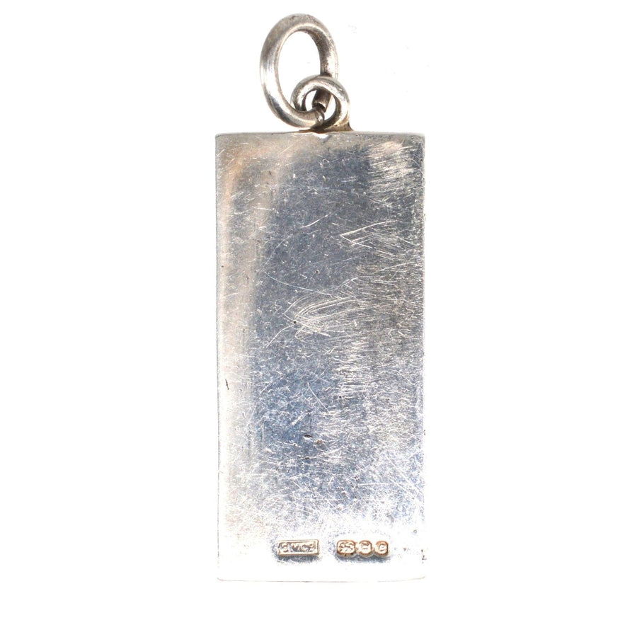 Vintage 1970s large silver domino pendant from London, showcasing a stylish and bold design.