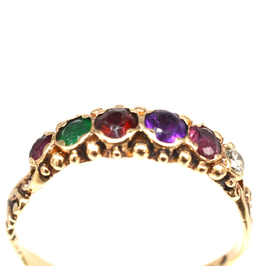 Vintage 9ct gold acrostic ring with ruby, emerald, garnet, amethyst, and diamond spelling 'REGARD'.
