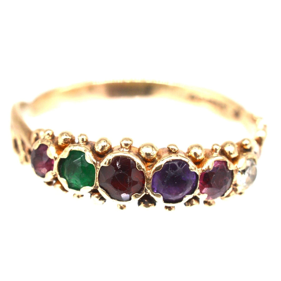Vintage 9ct gold acrostic ring with ruby, emerald, garnet, amethyst, and diamond spelling 'REGARD'.