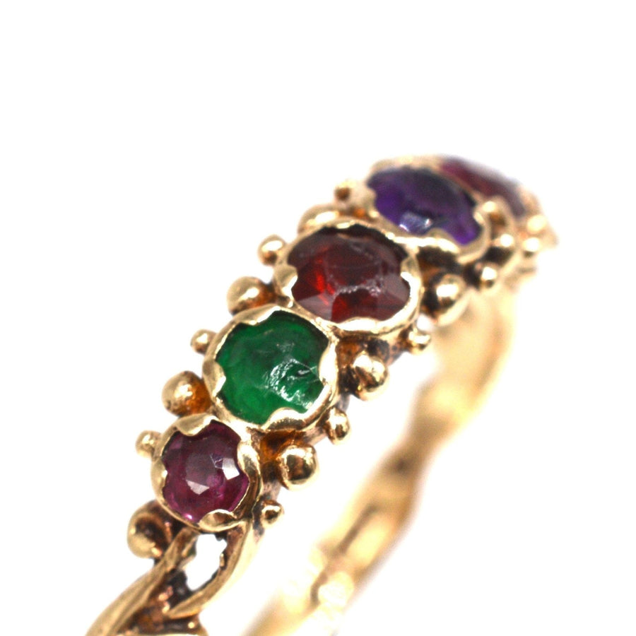 Vintage 9ct gold acrostic ring with ruby, emerald, garnet, amethyst, and diamond spelling 'REGARD'.