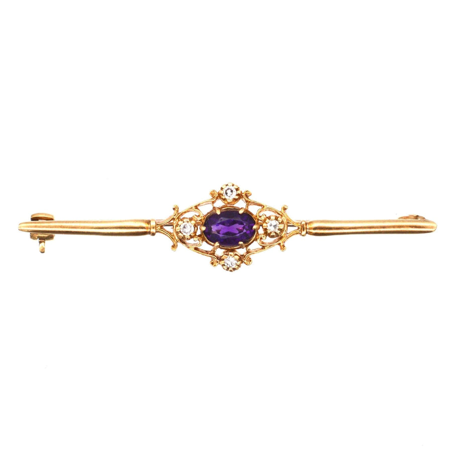 Vintage 9ct gold bar brooch featuring an amethyst and diamond centerpiece, a stylish accessory for any wardrobe.