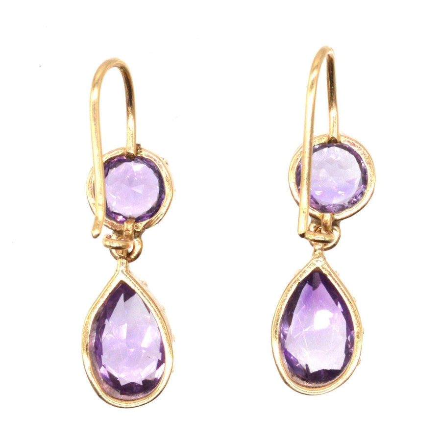 Vintage 9ct gold drop earrings featuring royal purple amethyst stones in a lovely teardrop design.