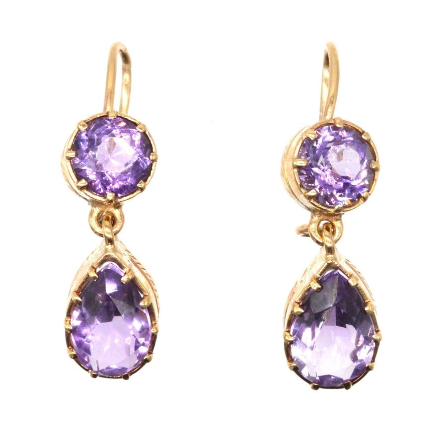 Vintage 9ct gold drop earrings featuring royal purple amethyst stones in a delicate design.