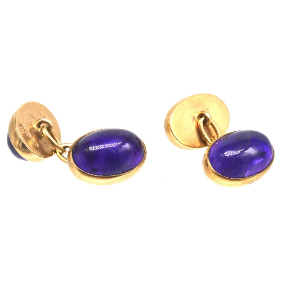 Vintage 9ct gold amethyst oval cufflinks from 1983 by Etienne Wilfred Verniquet with purple gemstones.