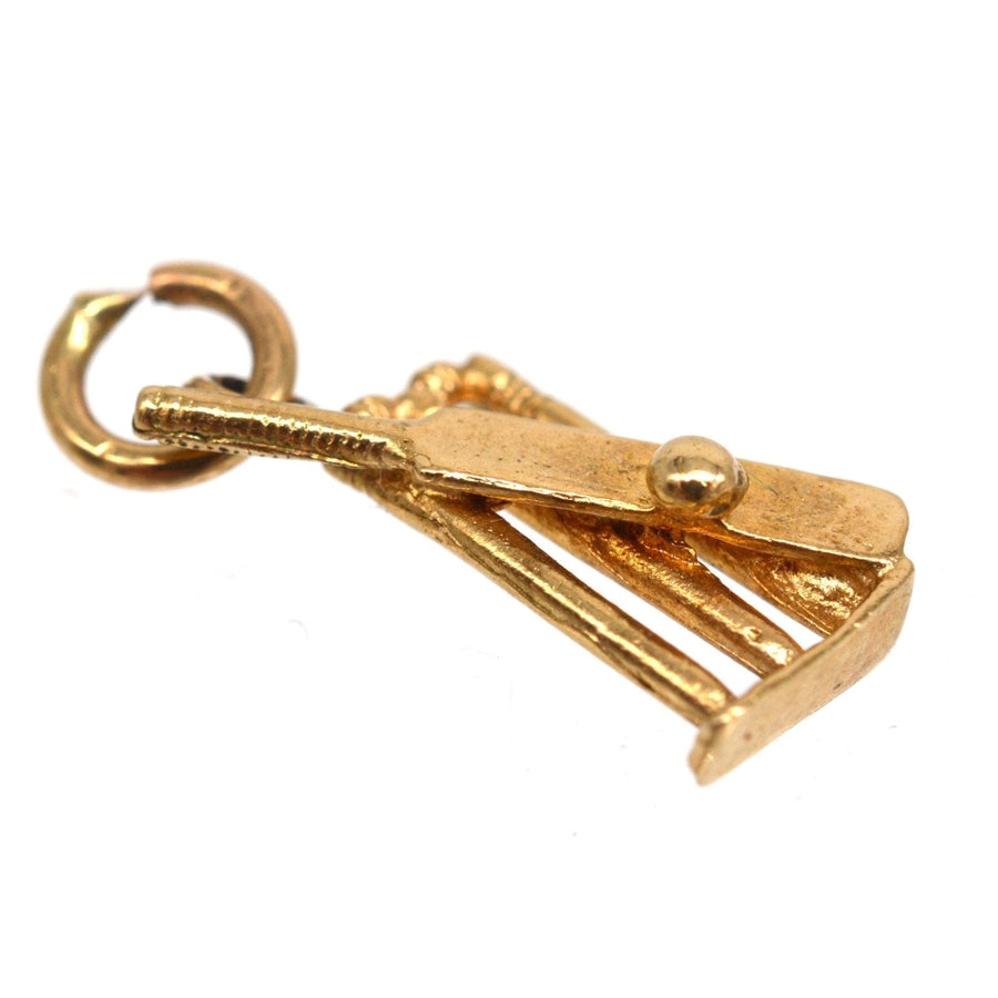 9ct gold cricket bat charm pendant, ideal for cricket fans as a necklace accessory.