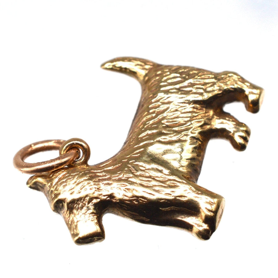 Vintage 9ct gold Scottie dog charm pendant, crafted in Birmingham, perfect for necklaces or bracelets.