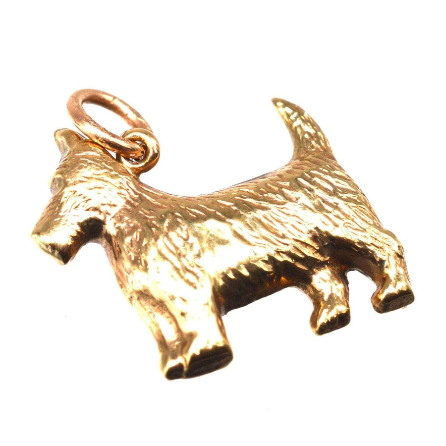 Vintage 9ct gold Scottie dog charm pendant, crafted in 1975, perfect for necklaces or bracelets.