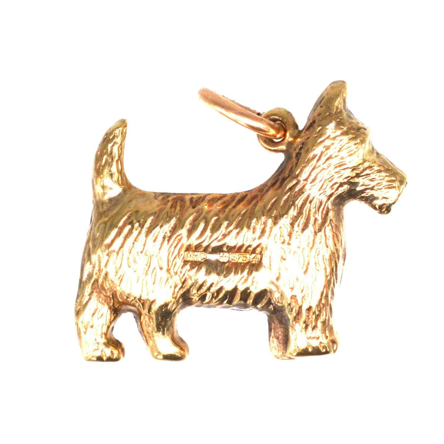 Vintage 9ct gold Scottie dog charm pendant from 1975, ideal for chains or bracelets, depicting a Scottish Terrier.