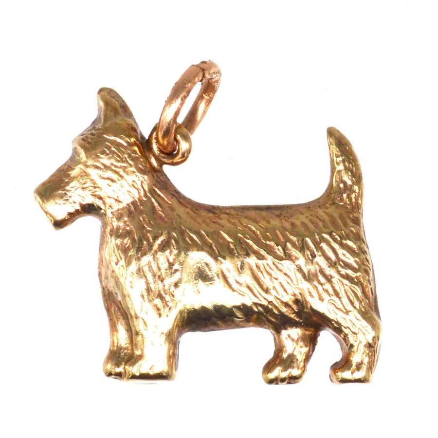 Vintage 9ct gold Scottie dog charm pendant from 1975, perfect for necklaces or bracelets.