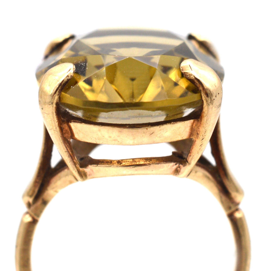 Vintage 9ct gold smoky quartz cocktail ring with a large faceted stone, highlighting its unique 1970s style.