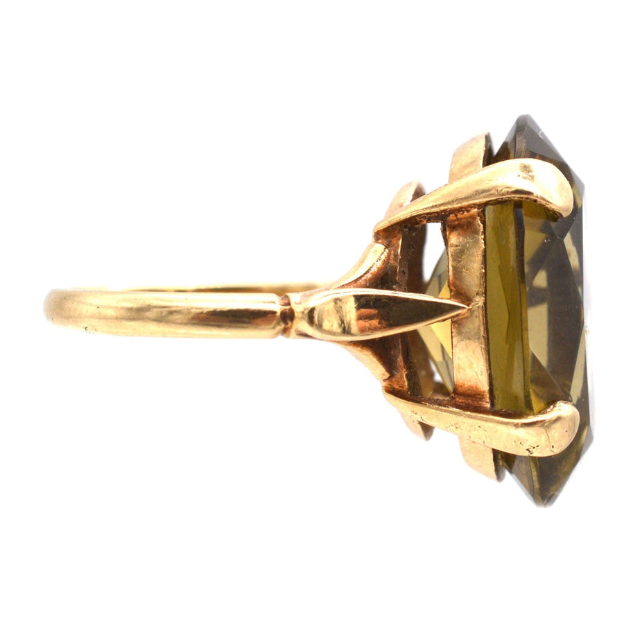 Vintage 9ct gold smoky quartz cocktail ring from 1971, showcasing an eye-catching design with a bold stone.