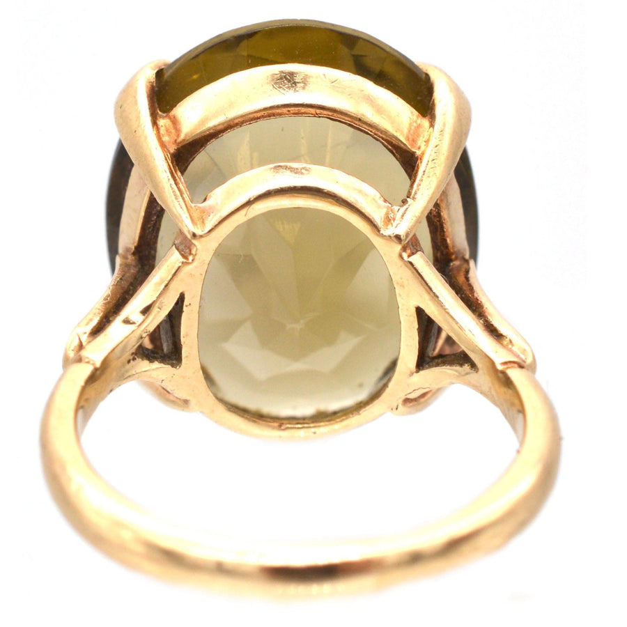 Vintage 9ct gold smoky quartz cocktail ring from 1971, featuring a bold and unique design.