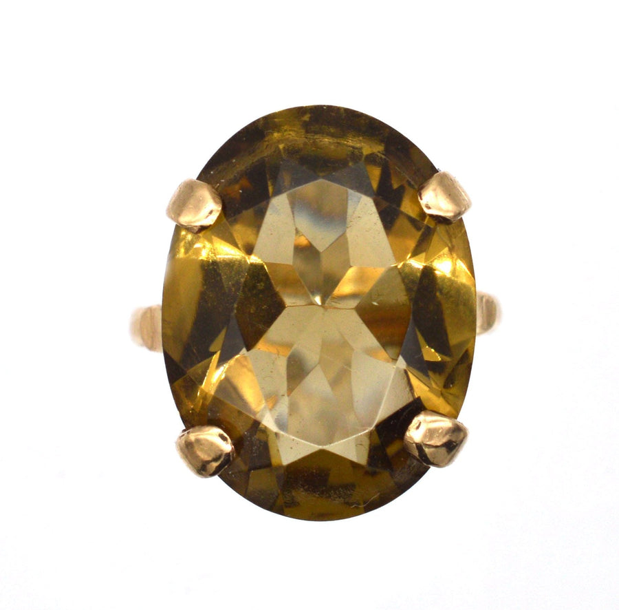 Vintage 9ct gold smoky quartz cocktail ring, oval gem set in a gold band, crafted in 1971.