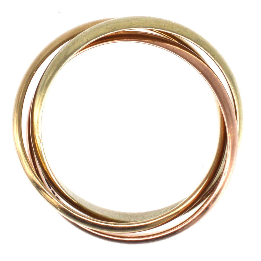 Vintage 9ct gold Trinity ring featuring three intertwined bands in yellow, white, and rose gold for unisex style.