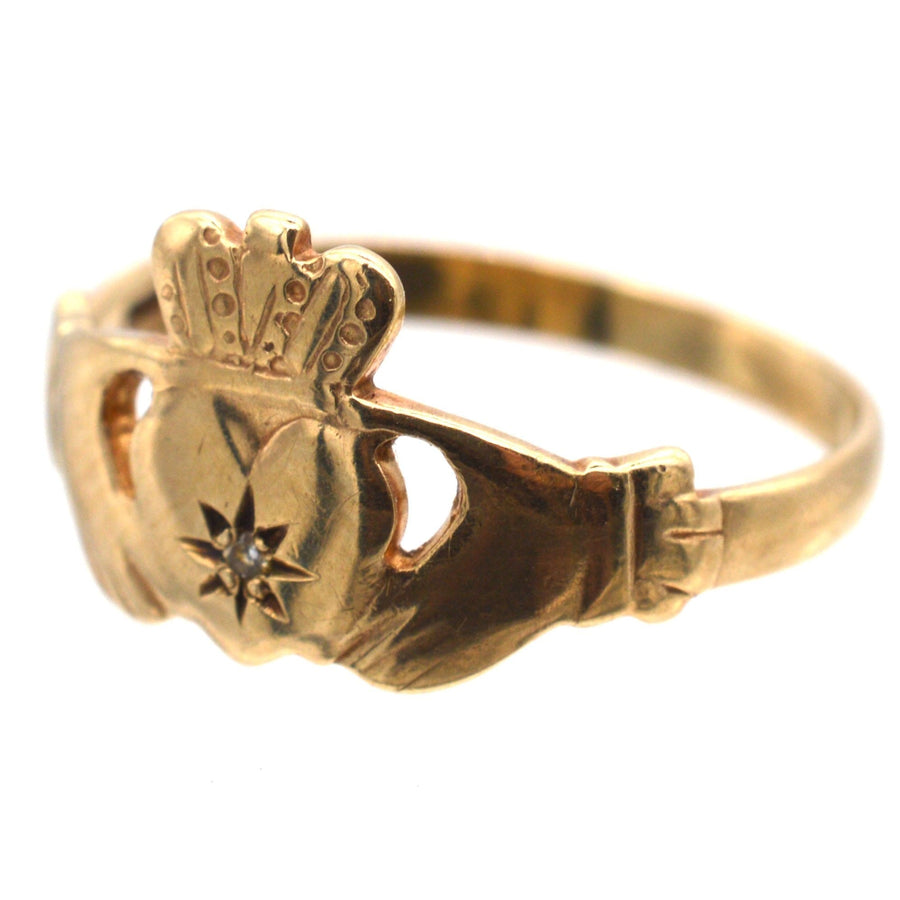 Vintage 9ct Irish Claddagh ring featuring a diamond, symbolizing love, loyalty, and friendship.