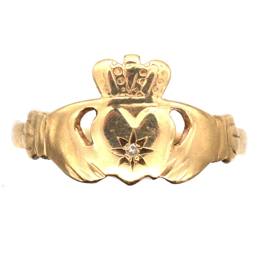 Vintage 9ct Irish Claddagh ring with diamond symbolizing love, loyalty, and friendship.