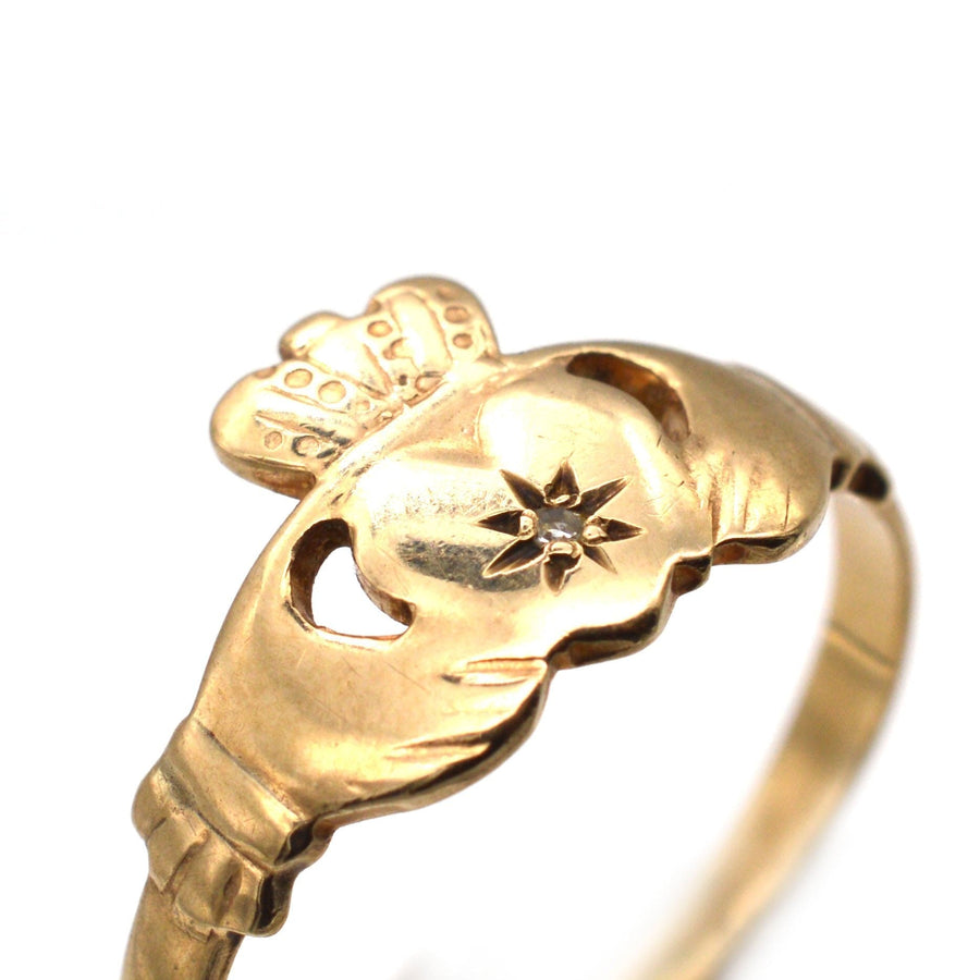 Vintage 9ct Irish Claddagh ring featuring hands, heart, and diamond symbolizing love, loyalty, and friendship.