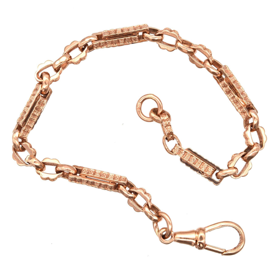 Vintage 9ct rose gold Albert chain bracelet, featuring intricate links and a lobster clasp, made in Sheffield in 1994.