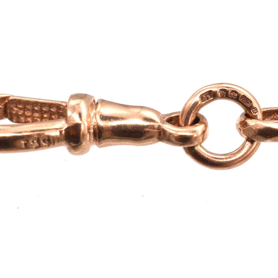 Close-up of vintage 9ct rose gold Albert chain bracelet clasp showing intricate detailing and craftsmanship.