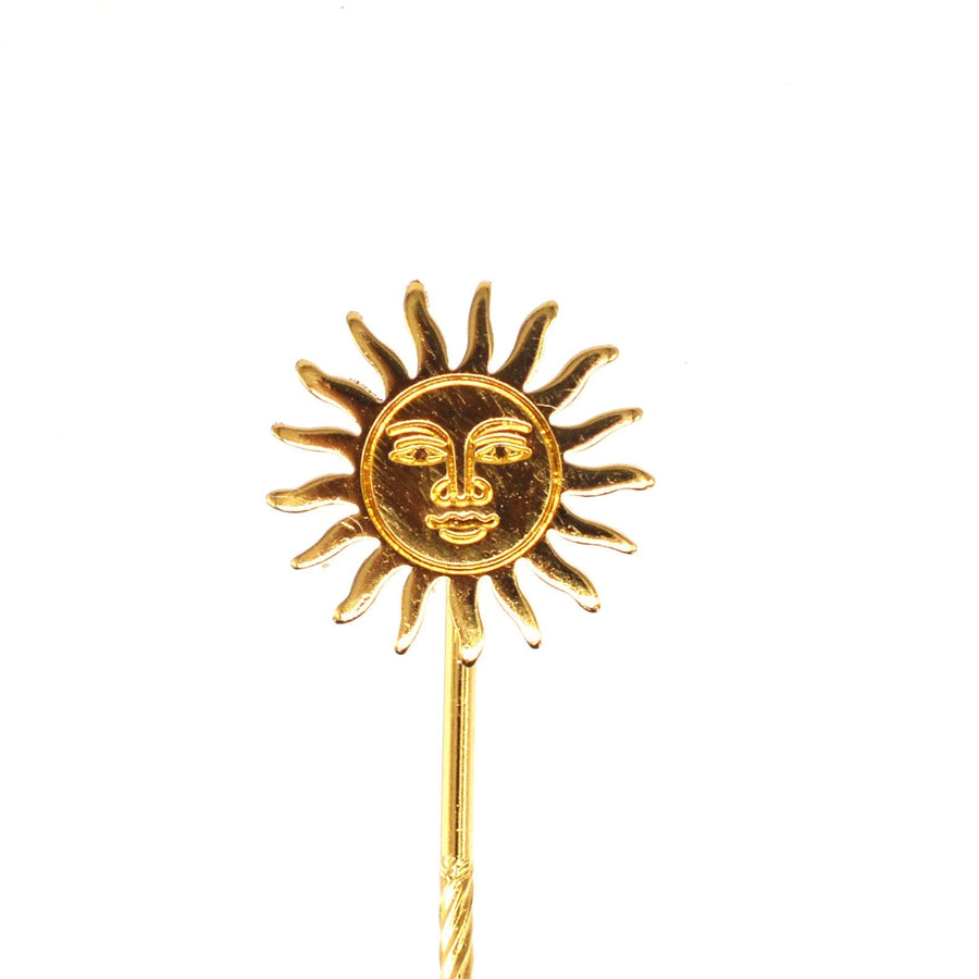 Vintage gold gilt sun tie pin featuring a face and wavy rays, perfect for adding a touch of elegance to any outfit.