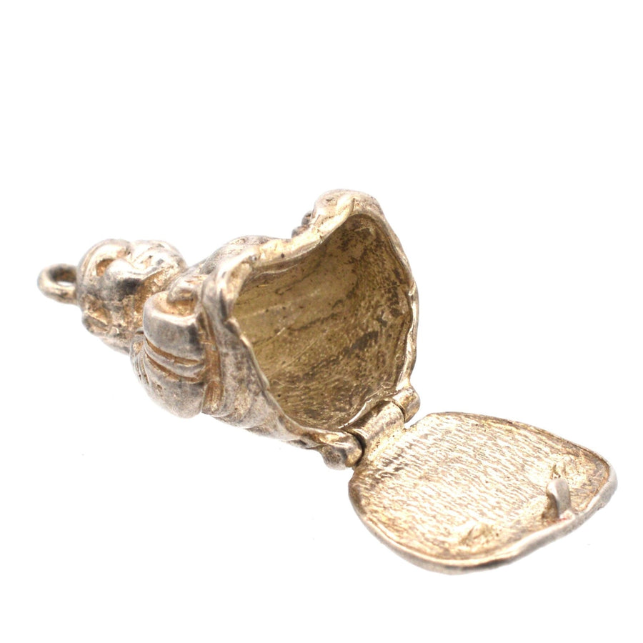 Vintage silver Buddha pendant charm from the 1970s, featuring a unique opening from the bottom, perfect for Buddhist followers.