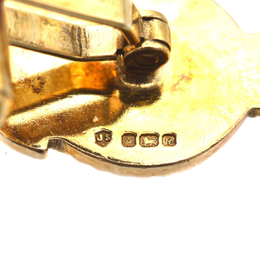 Close-up of hallmark on vintage silver gilt RAC cufflinks by Jack Spencer, showcasing 1991 Sheffield craftsmanship.