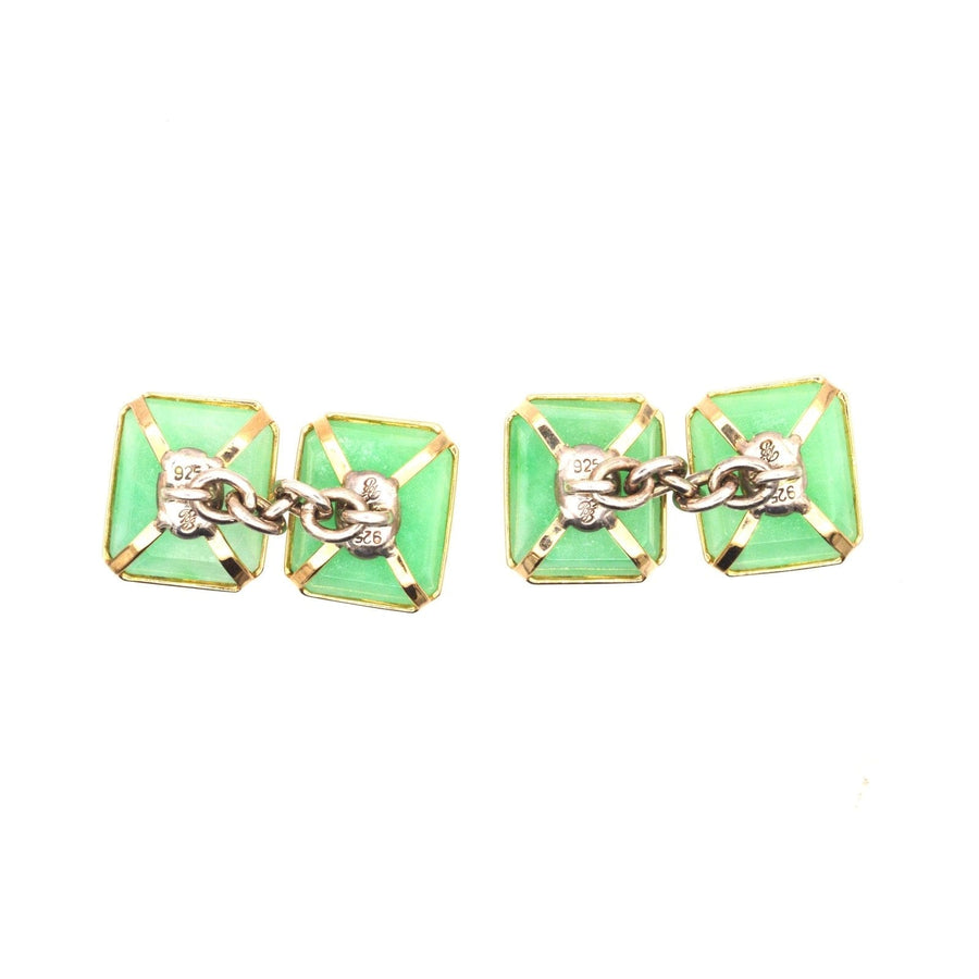 Vintage silver jade cufflinks featuring translucent green jadeite stones with a stylish Art Deco design.