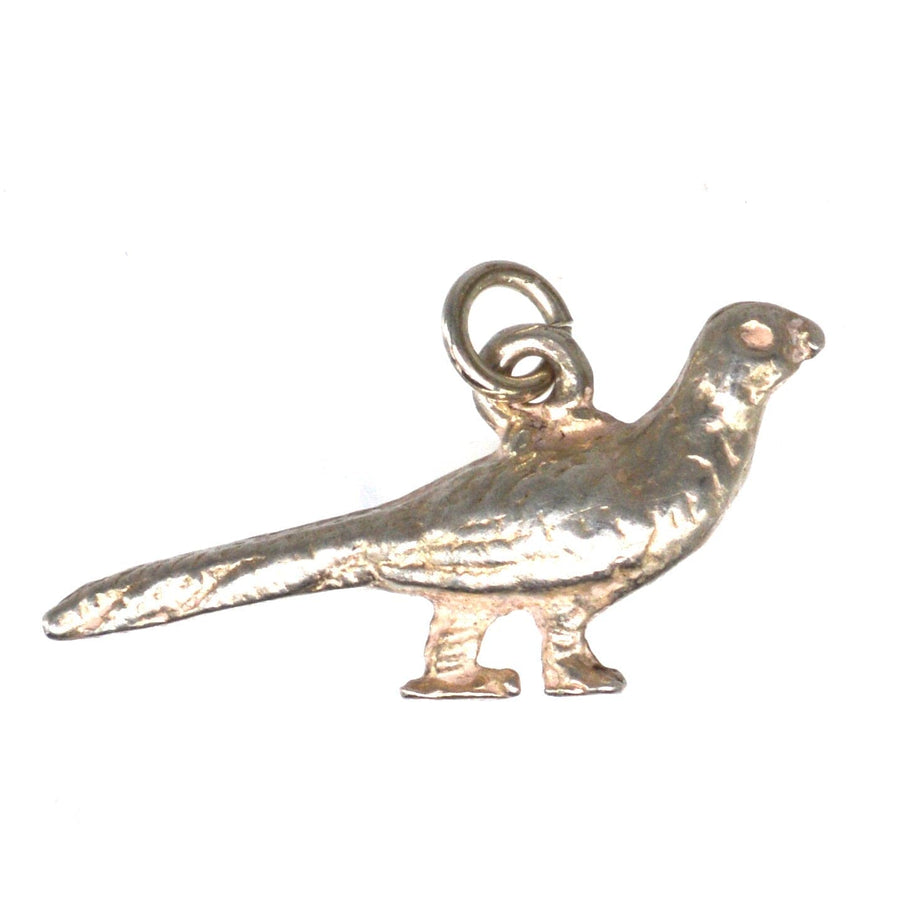 Vintage silver pheasant bird charm, perfect for charm bracelets and silver chains, showcasing detailed craftsmanship.
