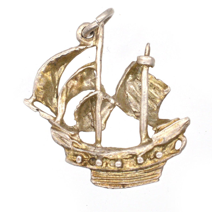 Vintage silver pirate ship pendant with skull sail, perfect for treasure lovers and jewelry enthusiasts.