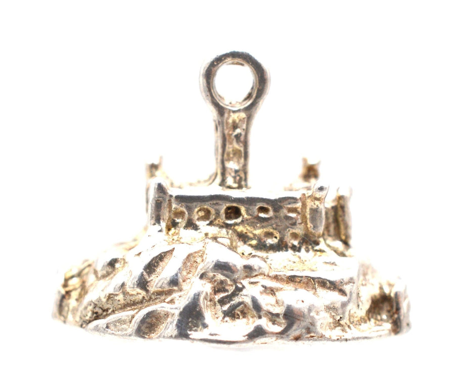 Vintage silver charm pendant of St Michael's Mount, depicting the medieval castle on a picturesque island in Cornwall.