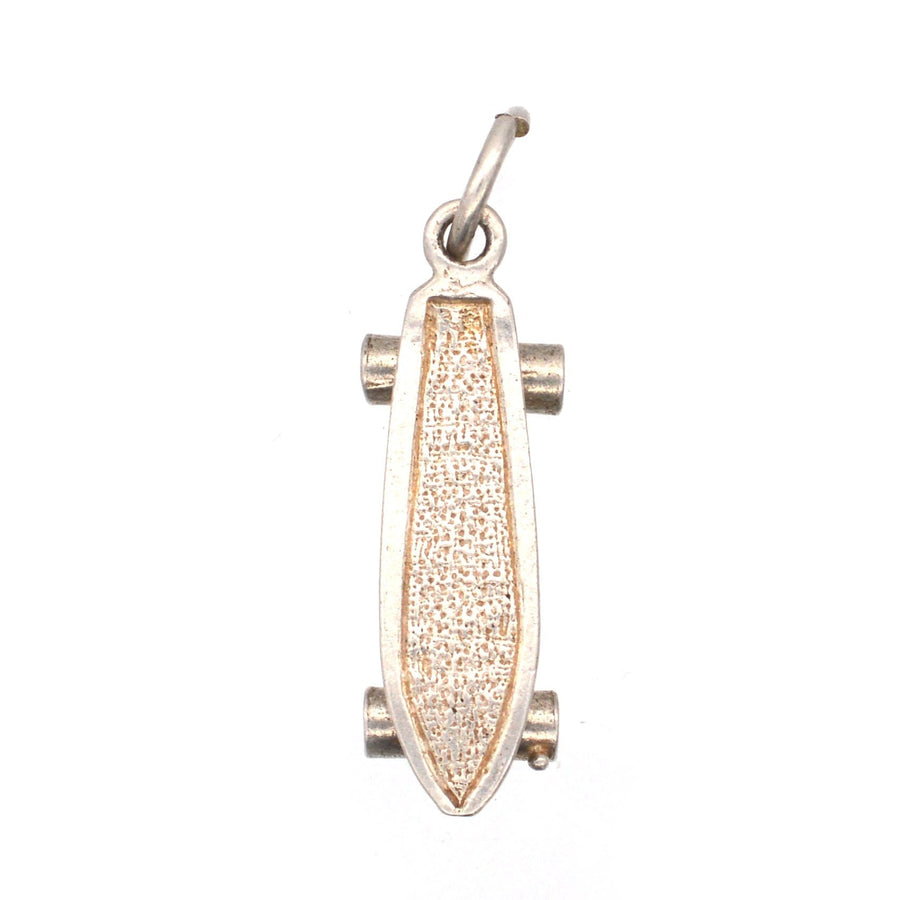 Vintage silver skateboard pendant charm with detailed texture and realistic design, perfect for jewelry lovers.