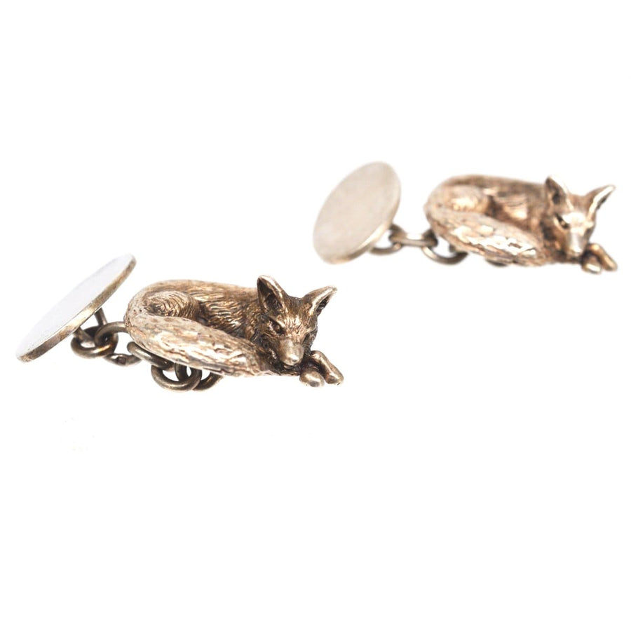 Vintage silver cufflinks featuring sleeping foxes by Lexi Dick, crafted in 1985 using the lost wax method.