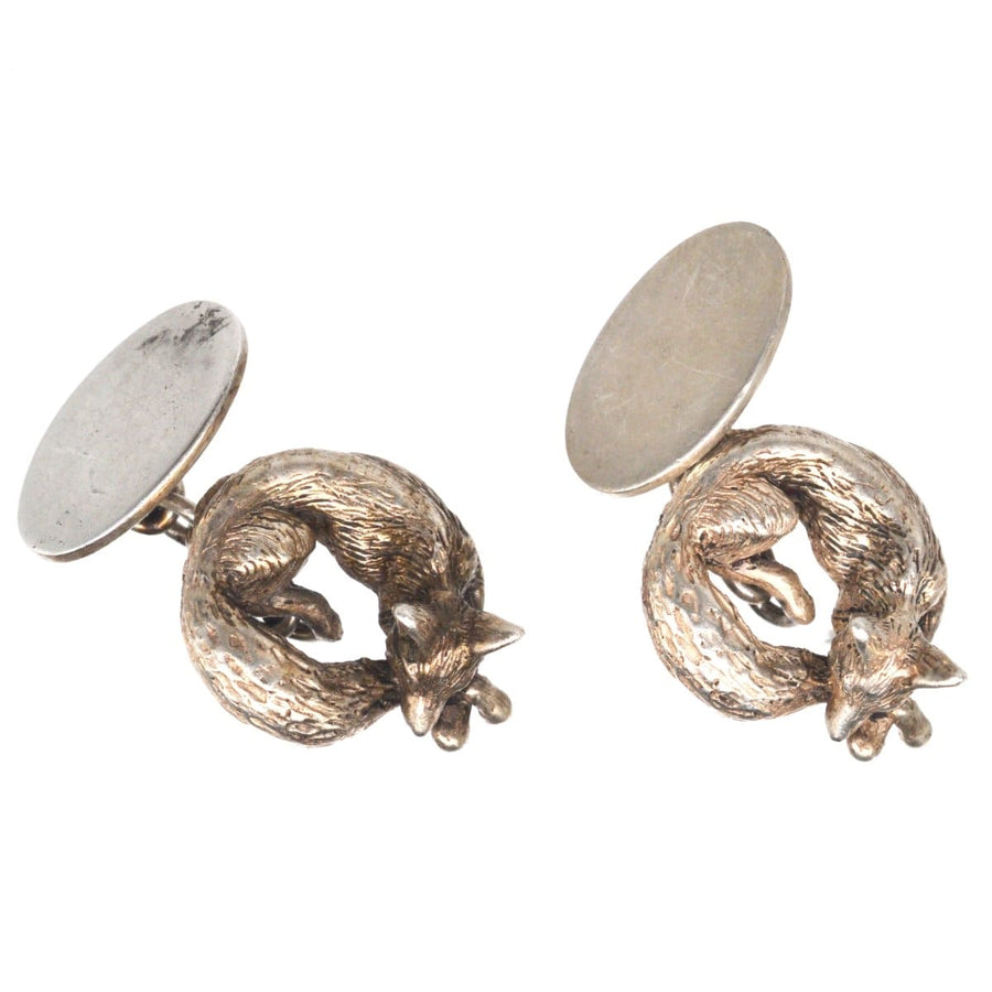 Vintage silver cufflinks featuring sleeping foxes by Lexi Dick, crafted using the lost wax method.