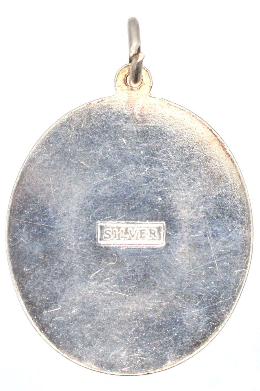Vintage silver St Christopher pendant back view, showing silver hallmark and classic design from the 1970s.