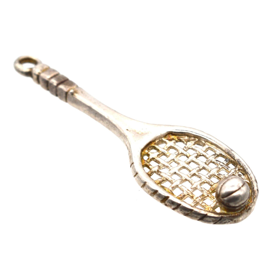 Vintage silver tennis racket pendant with a tennis ball, perfect accessory for tennis lovers and Wimbledon fans.
