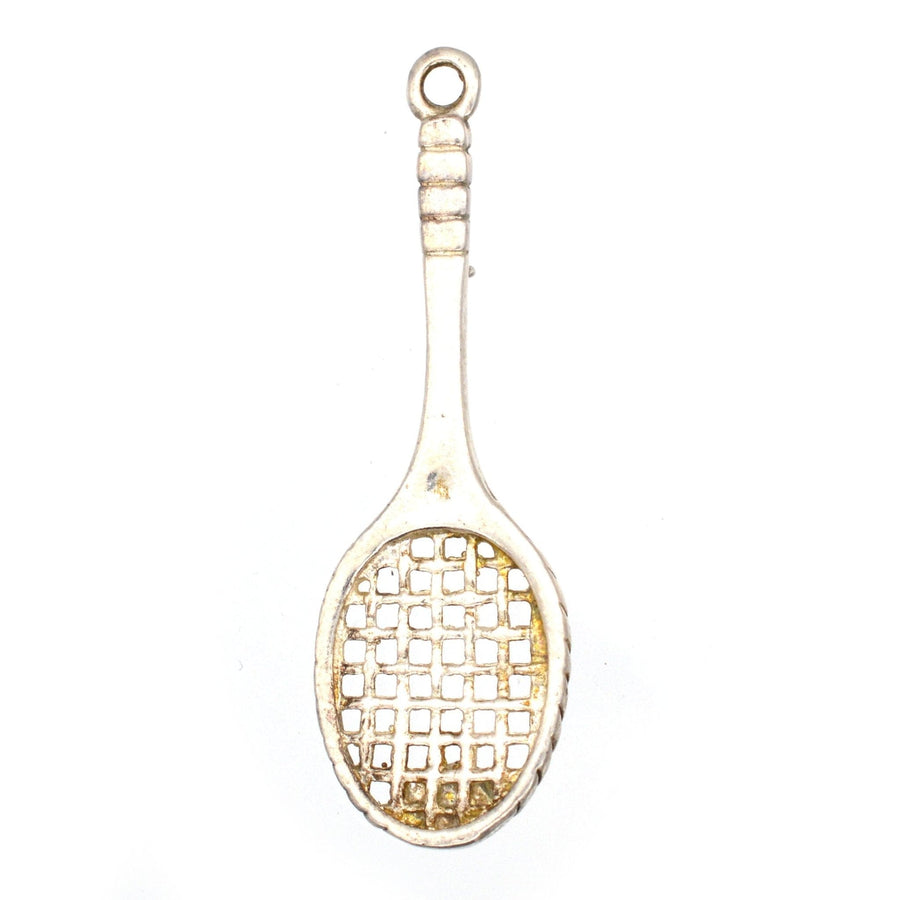 Vintage silver tennis racket pendant with intricate detail, perfect for tennis lovers and Wimbledon fans.