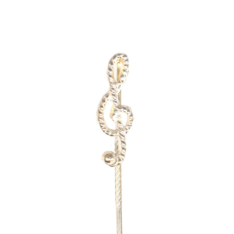 Vintage silver treble clef tie pin featuring rope detail, perfect for music lovers and stylish accessory enthusiasts.