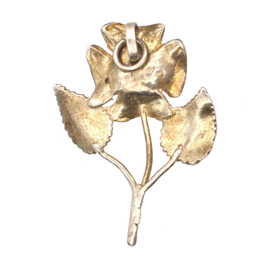 Vintage silver single rose pendant from the 1970s, featuring leaves and a romantic design for gifts.