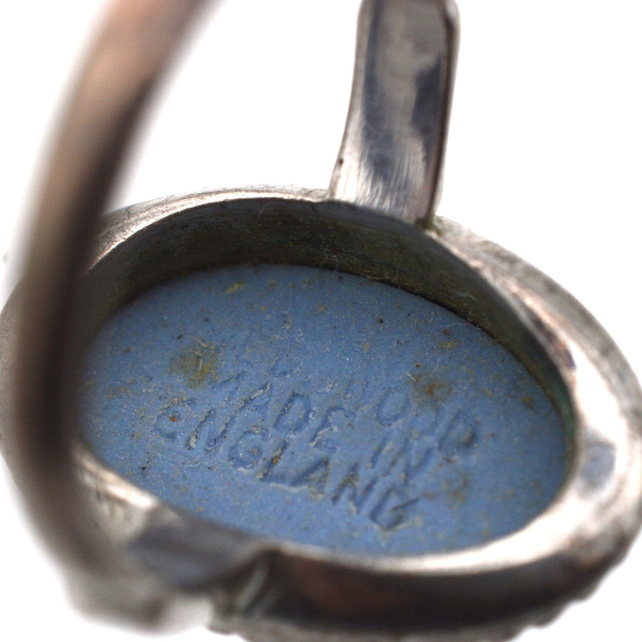 Underneath view of vintage Wedgwood plaque ring showing blue interior marked 'Wedgwood Made in England'.