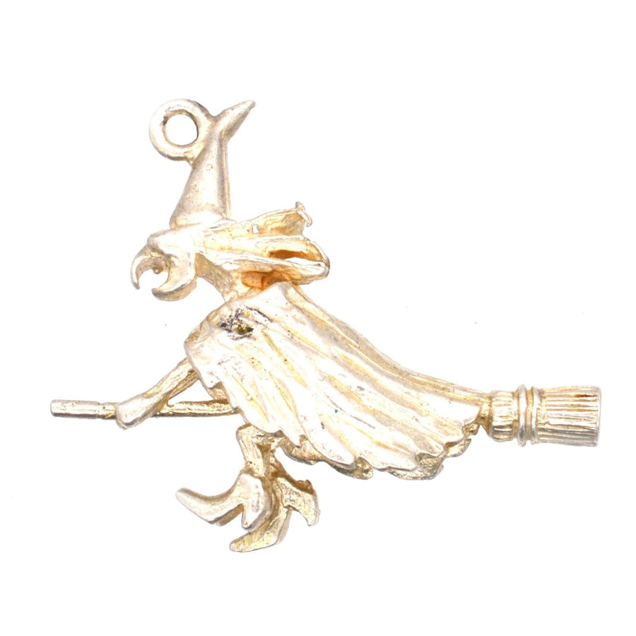 Vintage silver witch pendant on broomstick, perfect for Halloween or gifting to someone special. Made in the 1970s.