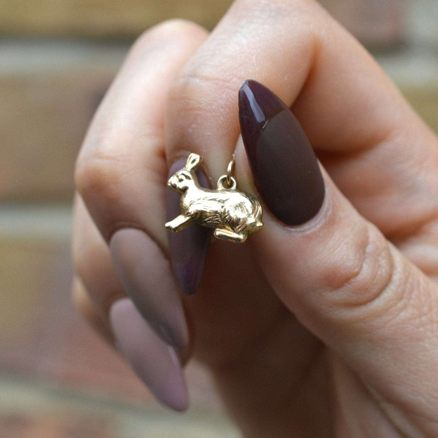 9ct gold bunny rabbit charm pendant held in hand, perfect for gifts or Easter celebrations.