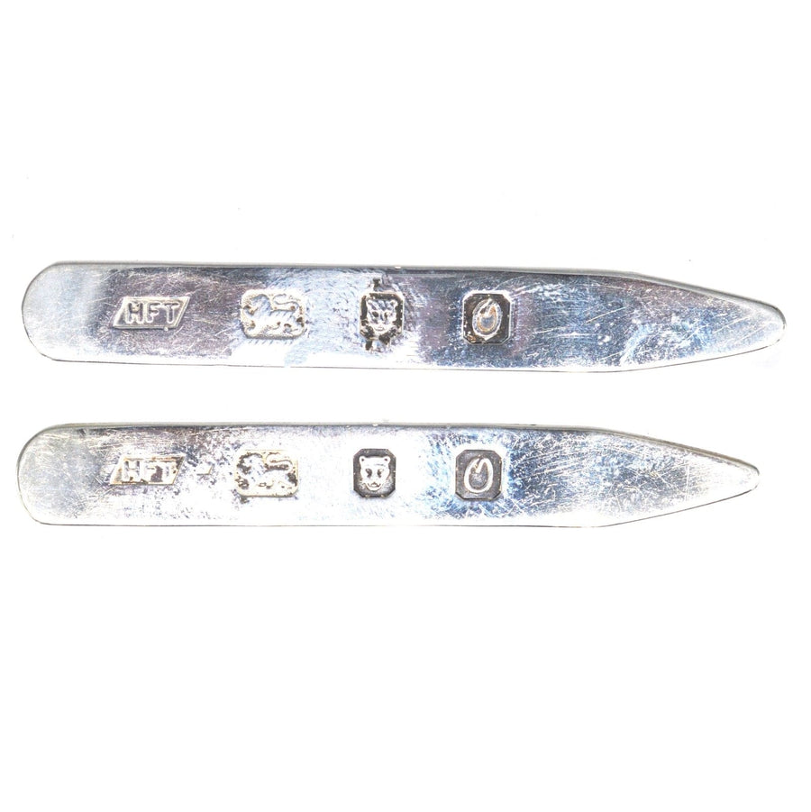 Vintage sterling silver shirt collar stiffeners with hallmark details, ideal for a polished and professional look.